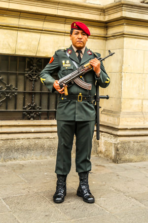 LIMA, PERU - SEPTEMBER 29, 2016:   Peruvian Armed Forces guard in front of  Peruvian Government...