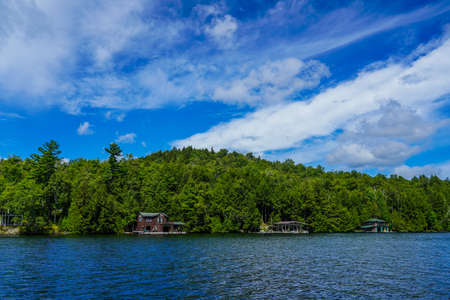 LAKE PLACID, NEW YORK - AUGUST 20, 2020: Luxury boathouse on Lake Placid in New York State's Adirondack Mountainsのeditorial素材