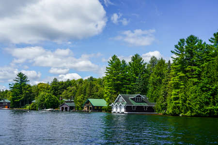 LAKE PLACID, NEW YORK - AUGUST 20, 2020: Luxury boathouse on Lake Placid in New York State's Adirondack Mountainsのeditorial素材