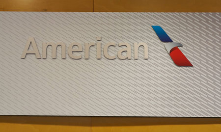 NEW YORK- JANUARY 28, 2020: American Airlines Logo at the Terminal 8 at JFK International Airportのeditorial素材