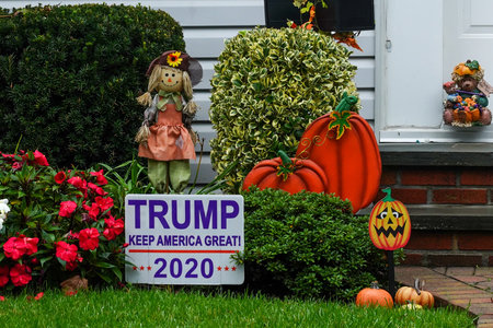 OCEANSIDE, NEW YORK - OCTOBER 20, 2020: Trump Keep America Great  2020 lawn sign on display in Long...