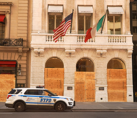 NEW YORK - NOVEMBER 5, 2020: Versace luxury retailer store at 5th Avenue boarded up in midtown...