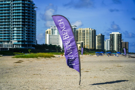 Private Beach sign on a beautiful white sandy beach in Floridaのeditorial素材