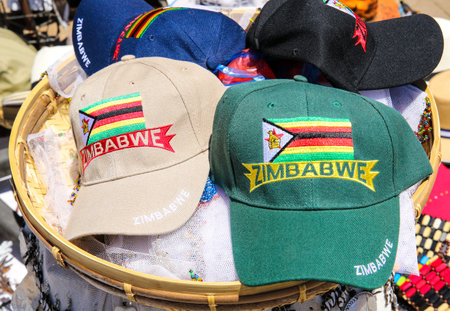 Local souvenirs on display at the street market near Victoria Falls National Park entrance on the Zimbabwe sideの写真素材