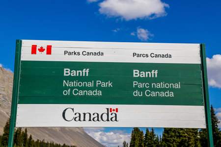 BANFF, CANADA - JULY 27, 2014: Banff National Park sign. Banff National Park is Canada's oldest national park, established in 1885 in the Rocky Mountainsのeditorial素材