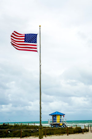 Hollywood Beach Lifeguard Station in South Florida. The promenade along the beach lined with palm trees and resorts is a popular tourist destination in Brの写真素材