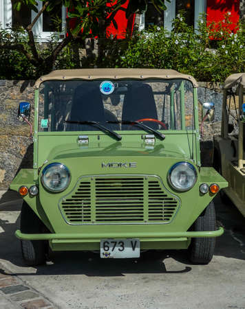 ST BARTS, FRENCH WEST INDIES - FEBRUARY 3, 2021: Colorful Mini Moke car in front of famous Eden Rock Hotel on the island of Saint Barthelemy, a French-speaking Caribbean islandのeditorial素材