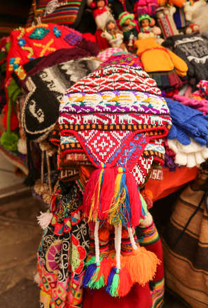 Local souvenirs at the traditional local market in Pisac, Sacred Valley, Peruの写真素材
