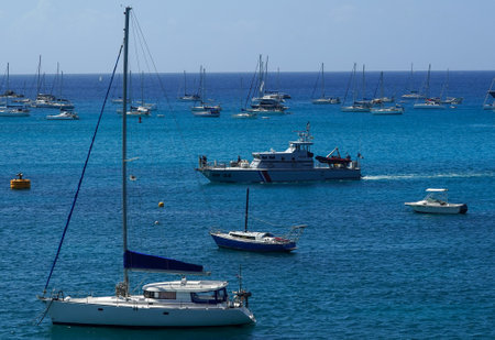 ST BARTS, FRENCH WEST INDIES - FEBRUARY 5, 2021: French coastguard boat DF 24 Douane anchored at the Gustavia harbor on the island of Saint Barthelemy, Caribbean island commonly known as St. Bartsのeditorial素材