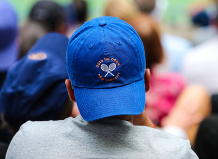 NEW YORK - SEPTEMBER 8, 2019: Tennis fan wears 2019 US Open hat at Billie Jean King National Tennis...