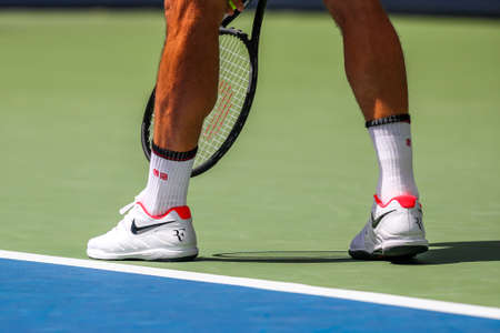 NEW YORK - SEPTEMBER 1, 2019: 20-time Grand Slam champion Roger Federer of Switzerland wears custom Nike tennis shoes during the 2019 US Open round of 16 match at National Tennis Center in New Yorkのeditorial素材