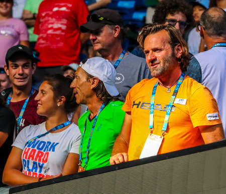 MELBOURNE, AUSTRALIA - JANUARY 27, 2019: 2019 Australian Open champion's Lorenzo Musetti of Italy coach Simone Tartarini (R) during trophy presentation after Boys' Singles final match in Melbourneのeditorial素材