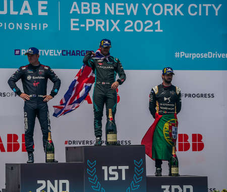 NEW YORK - JULY 11, 2021: Winners Nick Cassidy (NZL), Sam Bird (GBR) and Antonio Felix Da Costa (PRT) seen during trophy presentation after 2021 New York City E-Prix Formula E Race 11 at Red Hookのeditorial素材