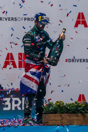 NEW YORK - JULY 11, 2021: 2021 New York City E-Prix Formula E Race 11 winner Sam Bird (GBR) of Jaguar Racing celebrates victory during trophy presentation at Red Hook in Brooklyn, New Yorkのeditorial素材