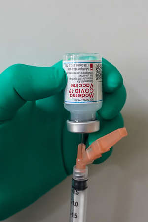 BROOKLYN, NEW YORK - JULY 17, 2021: Moderna COVID - 19 vaccine vial available in local pharmacy in Brooklyn, New Yorkのeditorial素材