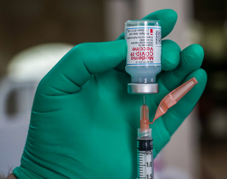 BROOKLYN, NEW YORK - JULY 17, 2021: Moderna COVID - 19 vaccine vial available in local pharmacy in Brooklyn, New Yorkのeditorial素材