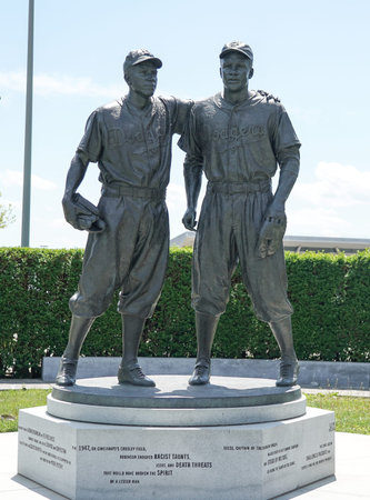 BROOKLYN, NEW YORK - MAY 11, 2021: Jackie Robinson and Pee Wee Reese Statue in front of MCU ballpark in Brooklynのeditorial素材