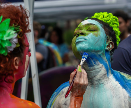 NEW YORK - JULY 25, 2021: Artists paint fully nude models of all shapes and sizes during 8th NYC Body Painting Day featuring artist Andy Golub at Union Square in New Yorkのeditorial素材