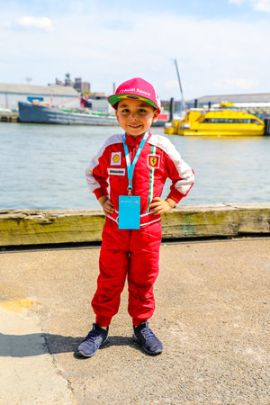 NEW YORK - JULY 14, 2019: Young racing fan wearing racing suit during 2019 New York City E-Prix at Red Hook in Brooklynのeditorial素材
