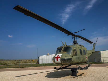 PENROSE, COLORADO - AUGUST 10, 2021: The Bell UH-1 Iroquois helicopter at the Colonel Leo Sidney Boston War Memorial Park in Fremont County Airport, Coloradoのeditorial素材