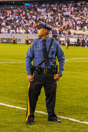 EAST RUTHERFORD, NJ - JULY 26, 2019: New Jersey State Police officer provides security during match...