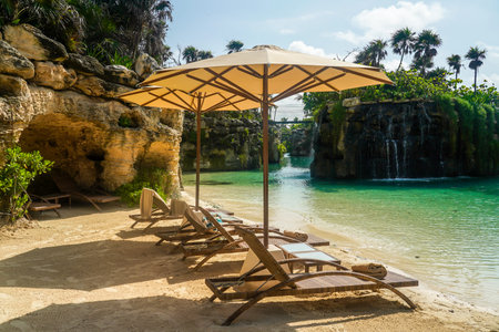 PLAYA DEL CARMEN, MEXICO - JULY 6, 2021: Beach at the Hotel Xcaret Mexico in Playa del Carmen, Mexicoのeditorial素材