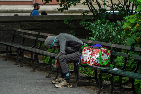 NEW YORK CITY - JULY 20, 2021: Homeless man near Central Park in Midtown Manhattanのeditorial素材