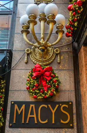NEW YORK - NOVEMBER 28, 2021: Macy's sign with Christmas decoration at Macy's Herald Square on Broadway in Manhattan. In 1924 Macy's was declared the "World's Largest Store"のeditorial素材