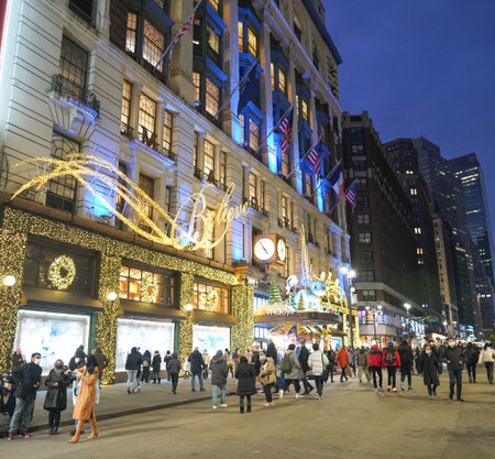 NEW YORK - NOVEMBER 28, 2021: Entrance sign at the Macy's Herald Square decorated with Tiptoe...