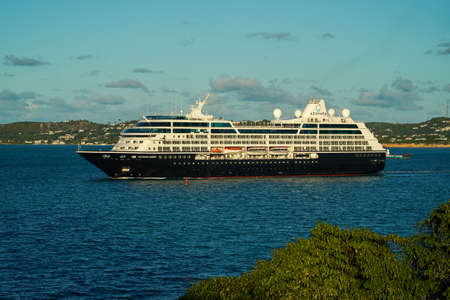 ST. JOHN - ANTIGUA AND BARBUDA, JANUARY 1, 2022: Azamara Quest Cruise Ship leaving the port of St. John's in Antigua and Barbudaのeditorial素材