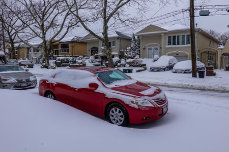 BROOKLYN, NEW YORK - JANUARY 29, 2022: Car under snow in Brooklyn, New York after massive Winter Storm Kenan strikes Northeastのeditorial素材