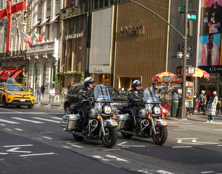 NEW YORK - DECEMBER 5, 2021: NYPD Highway Patrol officers on motorcycles providing security in...