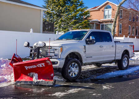 BROOKLYN, NEW YORK - JANUARY 30, 2022: Snow plow truck in Brooklyn, NY ready to clean streets after massive Winter Storm Kenan strikes Northeastのeditorial素材