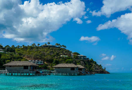 FIVE ISLANDS VILLAGE, ANTIGUA - JANUARY 5, 2022: Overwater Bungalow at the Royalton Antigua Resort, located on the scenic shores of Deep Bayのeditorial素材