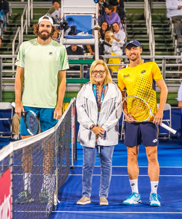 DELRAY BEACH, FLORIDA - FEBRUARY 19, 2022: Reilly Opelka of United States (L) and John Millman of Australia before semi-final match at the 2022 Delray Beach Open tournament in Floridaのeditorial素材