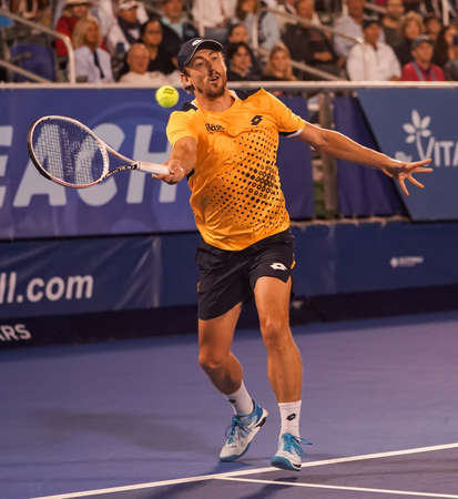 DELRAY BEACH, FLORIDA - FEBRUARY 19, 2022: Professional tennis player John Millman of Australia in action during his semi-final match at the 2022 Delray Beach Open tournament in Floridaのeditorial素材