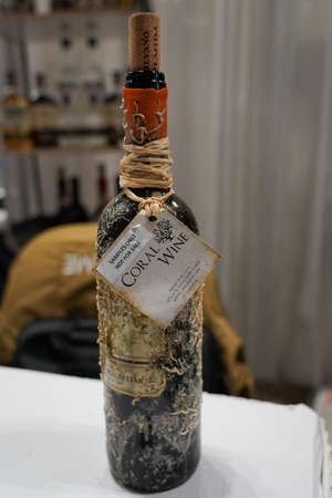 NEW YORK - MARCH 10, 2022: Unique coral wine presented at 2022 Vinexpo New York in Javits Convention Center. Coral Wine project is the first and only underwater wine cellar ageing wine under the seaのeditorial素材