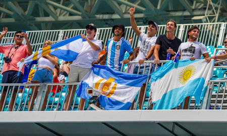 MIAMI GARDENS, FLORIDA - MARCH 30, 2022: Argentinian tennis fans support Francisco Cerundolo of Argentina during his quarter-final match at 2022 Miami Open at the Hard Rock Stadium in Miami Gardensのeditorial素材