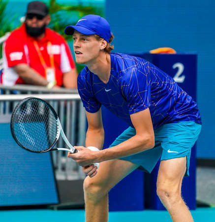 MIAMI GARDENS, FLORIDA - MARCH 30, 2022: Professional tennis player Jannik Sinner of Italy in action during his quarter-final match at 2022 Miami Open at the Hard Rock Stadium in Miami Gardens, FLのeditorial素材