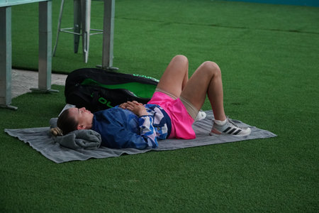 MIAMI GARDENS, FLORIDA - APRIL 1, 2022: Professional tennis player  Vera Zvonareva of Russia rests before 2022 Miami Open match at the Hard Rock Stadium in Miami Gardens, Floridaのeditorial素材
