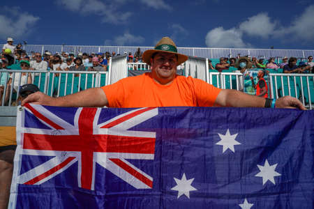 MIAMI GARDENS, FLORIDA - MARCH 31, 2022: Australian tennis fan supports Thanasi Kokkinakis and Nick Kyrgios during 2022 Miami Open doubles semi-final match in Miami Gardens, Floridaのeditorial素材