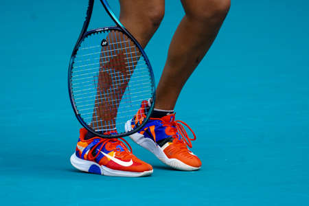 MIAMI GARDENS, FLORIDA - MARCH 31, 2022: Grand Slam Champion Naomi Osaka of Japan wears custom Nike tennis shoes during her semifinal match at 2022 Miami Open at the Hard Rock Stadium in Miami Gardensのeditorial素材