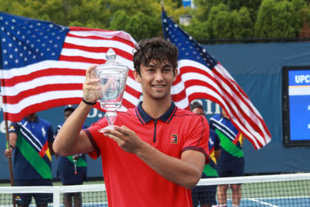 NEW YORK - SEPTEMBER 11, 2021: 2021 US Open boys' singles champion Daniel Rincon of Spain during trophy presentation after his final match at Billie Jean King National Tennis Center in New Yorkのeditorial素材