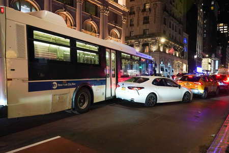 NEW YORK - DECEMBER 4, 2021: Car accident involving New York City Bus at the 5th Avenue in Midtown Manhattanのeditorial素材