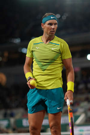 PARIS, FRANCE - MAY 31, 2022: Grand Slam champion Rafael Nadal of Spain in action during his quater-final match against Novak Djokovic of Serbia at 2022 Roland Garros in Parisのeditorial素材