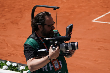 PARIS, FRANCE - JUNE 1, 2022: Amazon Television cameramen  broadcasts from Court Philippe Chatrier...