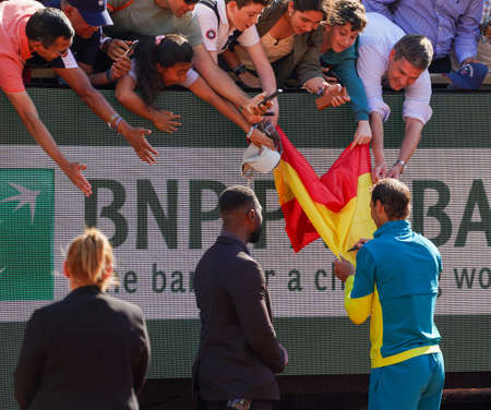 PARIS, FRANCE - JUNE 5, 2022: Grand Slam champion Rafael Nadal of Spain signs autographs after his victory over Casper Ruud at men's singles final match at 2022 Roland Garrosのeditorial素材