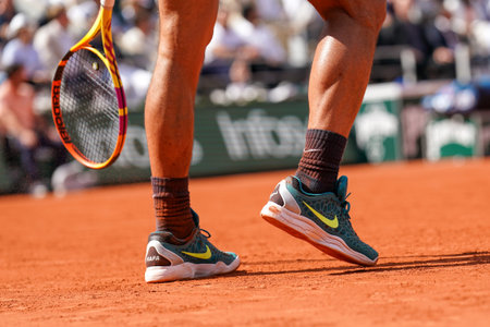 PARIS, FRANCE - JUNE 5, 2022: Grand Slam champion Rafael Nadal of Spain wears custom Nike tennis...
