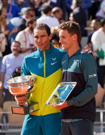 PARIS, FRANCE - JUNE 5, 2022: 2022 Roland Garros Champion Rafael Nadal of Spain (L) and Casper Ruud of Norway during trophy presentation after men's singles finalのeditorial素材