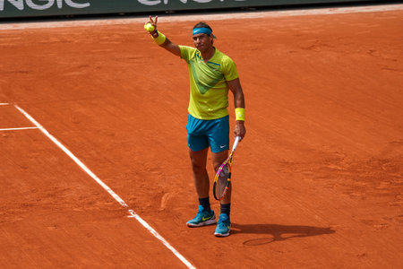 PARIS, FRANCE - JUNE 5, 2022: Grand Slam Champion Rafael Nadal of Spain in action during his men's singles final match against Casper Ruud of Norway at 2022 Roland Garros in Parisのeditorial素材